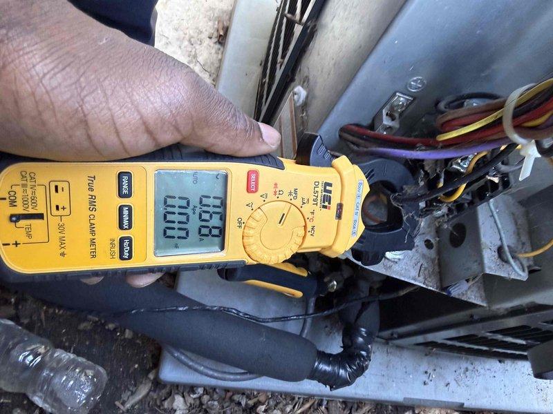 Completed scheduled preventive maintenance clean and check on air conditioning system per comfort plan agreement. Performed comprehensive system inspection including electrical diagnostics with digital clamp meter, verified proper amperage draws on compressor and fan motor circuits, inspected contactor and capacitor for signs of wear or degradation, and confirmed all electrical connections were secure and within manufacturer specifications. System found operating within normal parameters under current ambient conditions of 43°F with mostly cloudy skies.