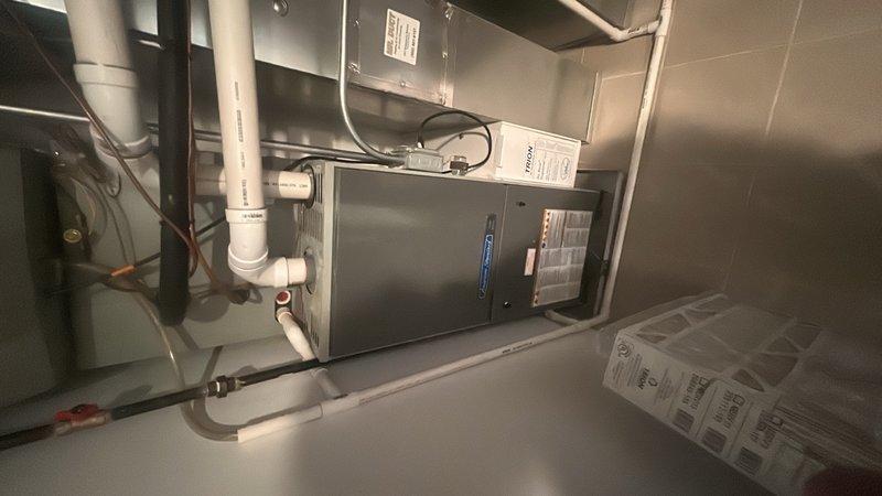 Performed comprehensive system evaluation of existing residential HVAC equipment including furnace and air conditioning unit installed in interior utility closet. Assessed current equipment condition, operational efficiency, and remaining service life to determine viability of repair versus replacement. Provided detailed estimate for complete system replacement including both heating and cooling components, with specifications for new high-efficiency furnace and air conditioning condenser unit installation.