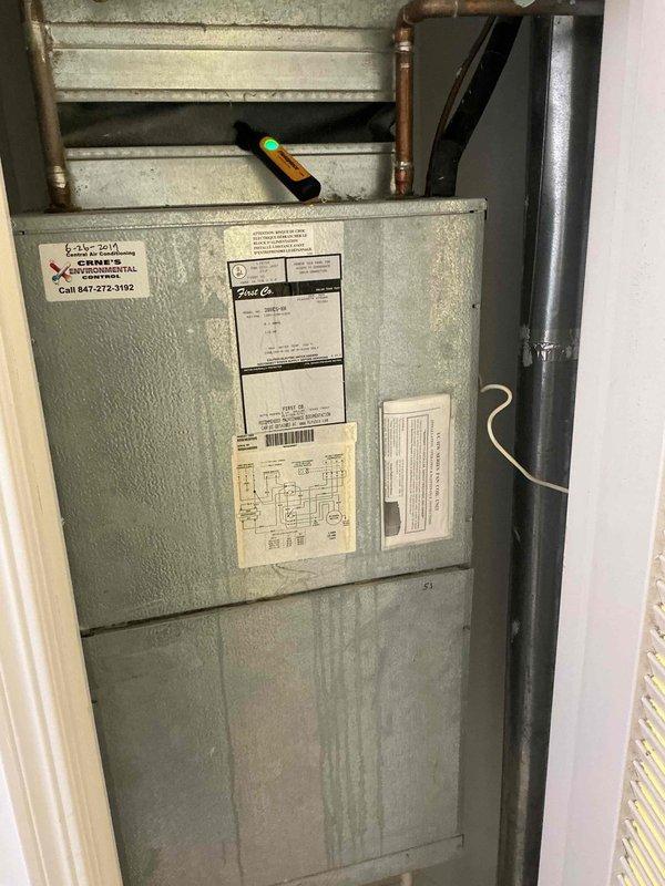 Responded to no cooling complaint at residential property. Upon arrival, found ecobee smart thermostat calling for cooling with system set to 80°F while indoor temperature reading 74°F. Performed diagnostic evaluation of furnace and air conditioning system. Inspected furnace unit and associated components including refrigerant lines and condensate drainage system. Documented equipment information and captured photographs of thermostat display and HVAC equipment for service records.