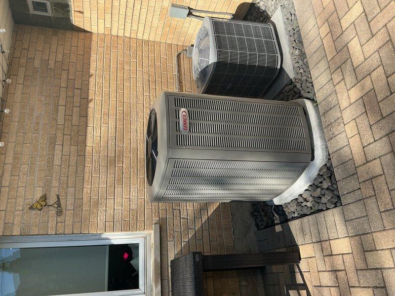 Completed full HVAC system replacement on second floor including furnace and air conditioning equipment. Disconnected and properly disposed of existing forced air furnace and A/C system after reclaiming refrigerant from condenser, coil, and line-set. Installed new Lennox SL280UH070V36AK 66K BTU 2-stage variable speed chimney vent furnace (Cat #26C63) and connected to existing supply/return ductwork with necessary sheet metal transitions. Attached furnace to existing gas line, electrical circuit, and exhaust system. Removed old A/C condenser and evaporator coil, then installed new Lennox EL18KCV-024-230 2-ton 18 SEER2 variable speed condensing unit (Cat #25U58) on new pad with pea gravel for proper leveling. Installed new evaporator coil and connected to existing copper refrigerant lines. Evacuated system to remove moisture and air, then charged with R454B refrigerant to manufacturer specifications. Performed complete startup procedures, tested and adjusted all equipment for proper oper