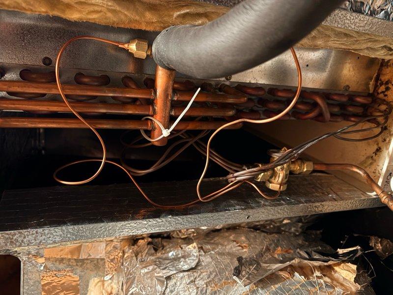 Replaced defective thermostatic expansion valve (TXV) under warranty on residential HVAC system. Coordinated part delivery to job site, removed and replaced faulty TXV, and returned defective component to office for warranty processing. System tested and confirmed operational upon completion.
