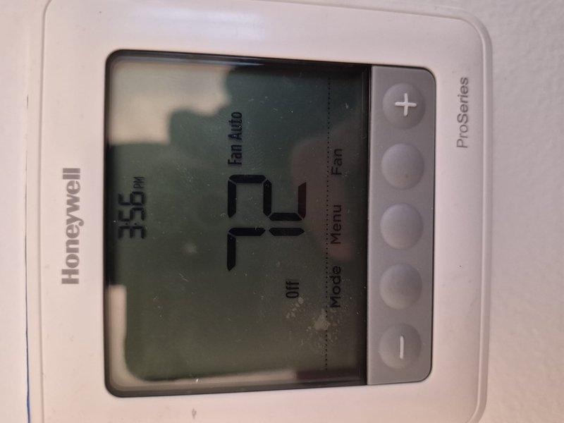 Completed comprehensive spring maintenance and clean and check service on single-system air conditioning unit per Comfort Plan agreement. Performed electrical diagnostics using digital multimeter to verify proper voltage and amperage readings at contactor, relay components, and control wiring. Inspected and tested all electrical connections, including low-voltage control circuits and line voltage components. Verified thermostat operation and calibration with Honeywell ProSeries digital control showing proper temperature reading and fan auto settings. System found operating within normal parameters with no deficiencies noted. All components tested and confirmed functioning correctly.