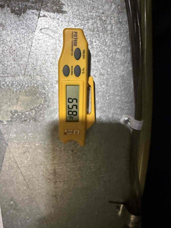 Completed air conditioning clean and check per service comfort plan. Performed system diagnostics with electrical measurements showing 5.9 amp draw and verified suction line temperature at 53°F. Unit operating within normal parameters with all components inspected and tested.
