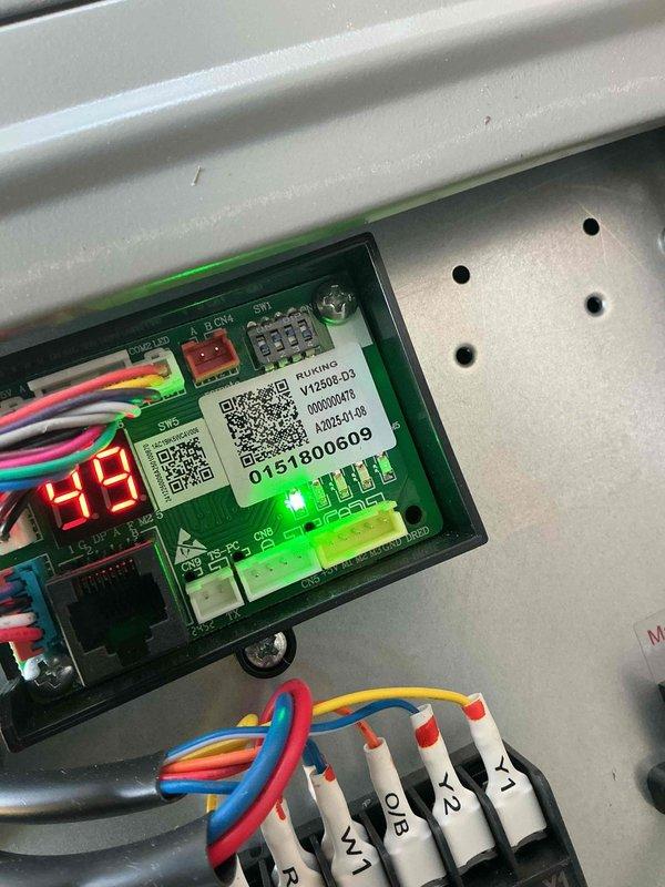 Responded to no-cooling complaint for second floor air conditioning system. Upon inspection, found control board displaying error code 49 on digital readout. Evaluated electronic control board (model V12603-03) and verified proper wiring connections at terminal strip including thermostat connections at R, C, Y1, and other low-voltage terminals. Inspected ecobee smart thermostat settings and reviewed threshold parameters including compressor minimum cycle off time (300 seconds), compressor minimum outdoor temperature (45°F), auxiliary heat maximum outdoor temperature (60°F), and AC overcool maximum (2°F). Documented equipment information and captured photos of control board assembly and thermostat configuration for service records. System evaluated per customer request with no charge authorization. Discussed comfort plan membership benefits and new customer discount opportunities with homeowner.