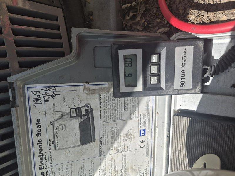 Completed spring clean and check on air conditioning system per comfort plan maintenance agreement. Performed comprehensive electrical diagnostics using multimeter to verify proper voltage and amperage across all components, including capacitor testing and contactor operation. Inspected and tested all electrical connections, relays, and wiring harness for proper function and secure terminations. Measured refrigerant charge using calibrated scale, recording 8.9 pounds of refrigerant in system. Verified refrigerant levels are within manufacturer specifications at this time, addressing previous concern regarding potential low charge condition. Cleaned condenser coil, checked condensate drain operation, and confirmed all safety controls functioning properly. System operating normally with all parameters within acceptable ranges.