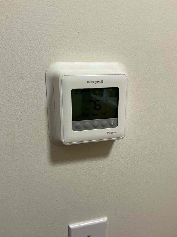 Completed comprehensive tune-up maintenance on residential air conditioning and air handler system. Performed clean and check procedures on all major components, inspected evaporator coil, refrigerant lines, electrical connections, and blower assembly. Replaced air filter and verified thermostat operation showing proper temperature control at 76 degrees.
