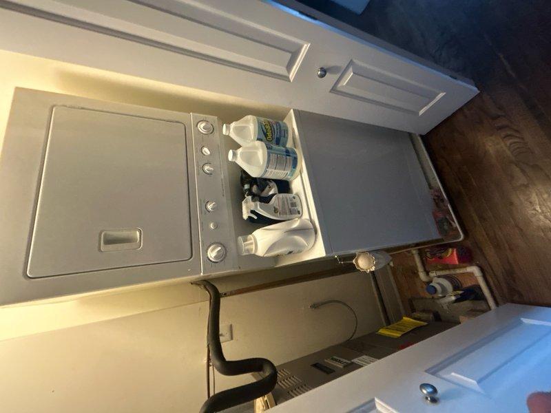Conducted comprehensive estimate for complete HVAC system replacement including both air conditioning unit and furnace, both original equipment dating from 2007. Air conditioning unit had failed previous year and was no longer operational. Assessed rooftop-mounted AC unit accessed via interior hatch and ladder. Evaluated existing furnace installation in interior utility space, noting current ductwork configuration and gas line connections. Documented equipment specifications, existing installation conditions, and access requirements. Photographed current equipment including furnace with visible manufacturer labeling and associated ductwork and plumbing components. Provided replacement recommendations for matched heating and cooling system appropriate for residential application.