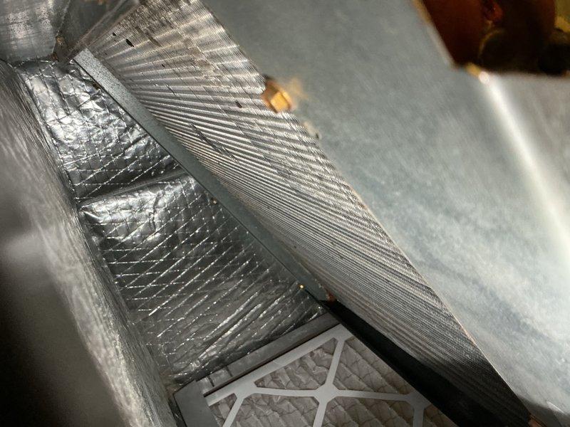 Completed comprehensive tune-up and maintenance on single-system HVAC unit, including air handler and condenser components. Performed thorough inspection of evaporator coil, refrigerant lines, and filter drier assembly, verifying all connections and component integrity. Inspected ductwork installation and insulation in attic space, confirming proper airflow pathways. Offered replacement of 12x20x1 air filter as part of routine maintenance to ensure optimal system performance and indoor air quality.