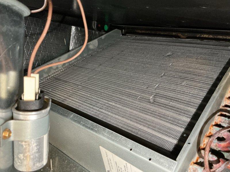 Completed comprehensive tune-up and maintenance on single-system HVAC unit, including air handler and condenser components. Performed thorough inspection of evaporator coil, refrigerant lines, and filter drier assembly, verifying all connections and component integrity. Inspected ductwork installation and insulation in attic space, confirming proper airflow pathways. Offered replacement of 12x20x1 air filter as part of routine maintenance to ensure optimal system performance and indoor air quality.