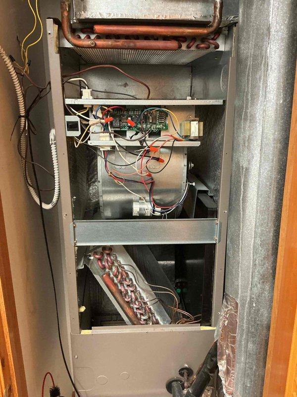 Completed air conditioning and air handler cleaning and check on single system. Performed diagnostic testing of electrical components using digital multimeter, inspected refrigerant lines and connections for proper operation, and evaluated evaporator coil condition. Replaced air filter and verified blower motor assembly, control board connections, and overall system functionality to ensure optimal performance.