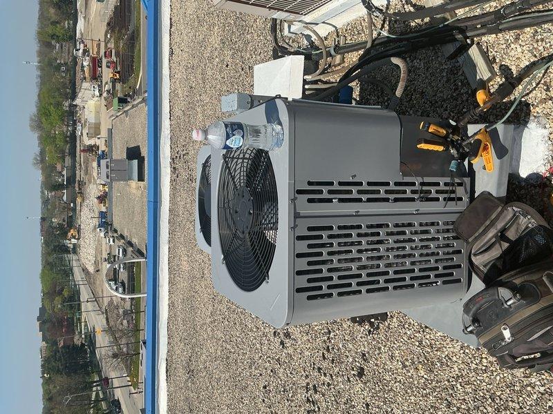 Completed spring tune-up and preventative maintenance on rooftop HVAC system. Performed comprehensive clean and check of air conditioning unit and air handler, installed new air filter, and conducted diagnostic testing with digital meter to verify system performance and proper operation. All components found operating within normal parameters and unit returned to service.