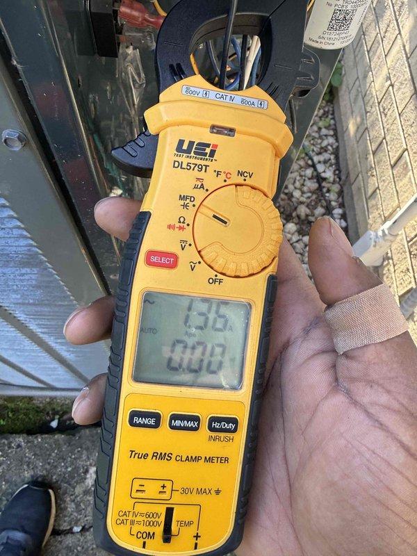 Completed comfort plan clean and check maintenance on American Standard Gold Series air conditioning system. Performed comprehensive system inspection including electrical measurements with clamp meter, verifying amperage draw at 13.6 amps. Changed media filter per service contract plan requirements. Inspected control boards, wiring connections, and internal components with access panel removed. All system components operating within normal parameters upon completion of maintenance service.