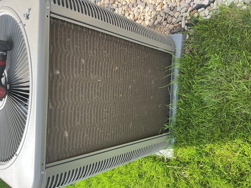 Completed spring maintenance clean and check on outdoor air conditioning condenser unit and mini-split system per Good Contractor Practice standards. Inspected heat exchanger coils which showed moderate accumulation of dirt, debris, and particulate matter between fins; cleaned condenser coils to restore proper airflow and heat transfer efficiency. Performed comprehensive system evaluation including fan operation, refrigerant connections, and overall unit condition to ensure optimal performance for the cooling season.
