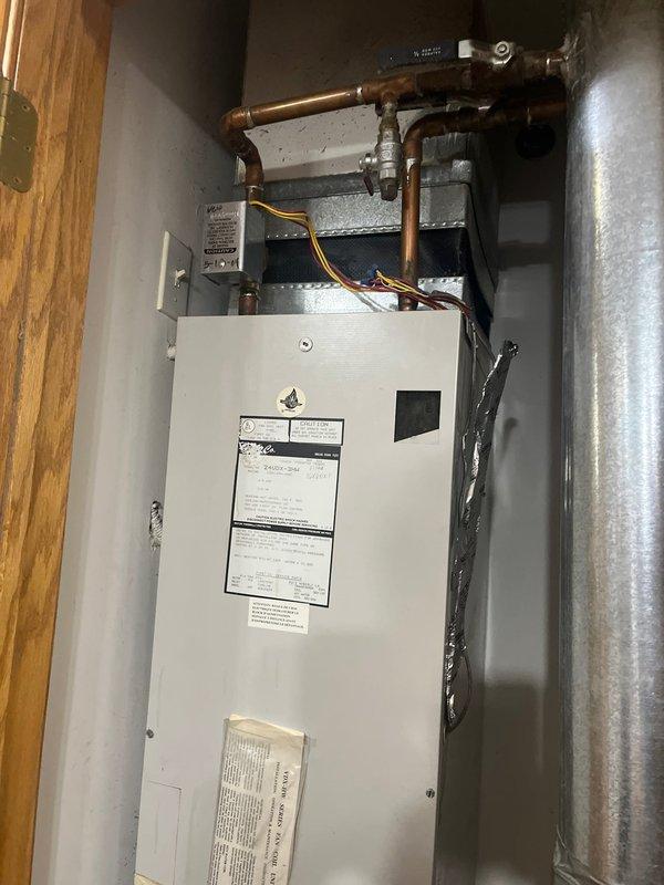 Performed clean and check service on residential air conditioning system and air handler unit. Inspected thermostat operation, verified system controls, replaced air filter, and confirmed all equipment functioning properly. System tested and left in operational condition.