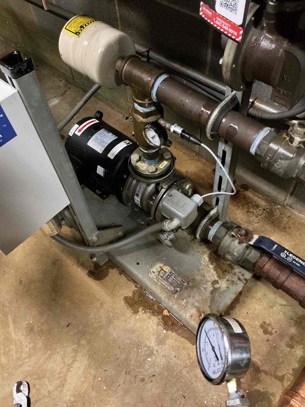 Responded to commercial plumbing service call to inspect and evaluate booster pump system. Upon arrival, conducted thorough assessment of the existing pump assembly, including pressure monitoring equipment, motor operation, and associated piping connections. Documented system configuration with pressure gauge readings and overall mechanical condition of the installation for maintenance records and future reference.