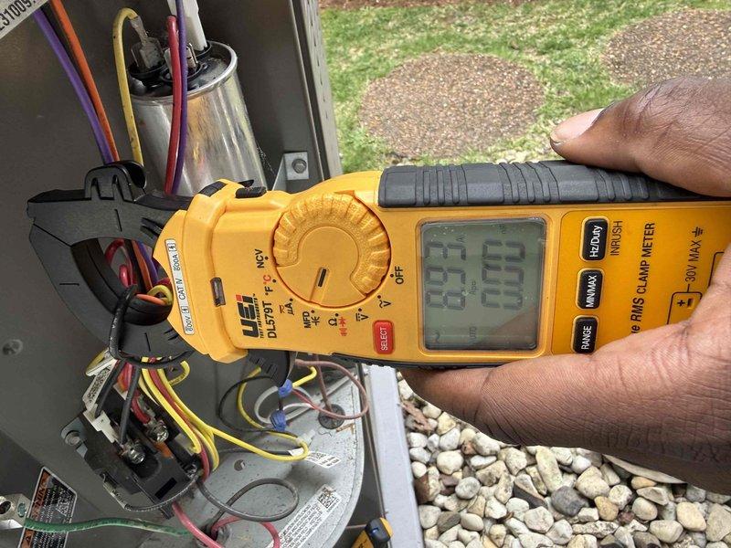 Responded to no cooling complaint on residential air conditioning system installed in 2023. Upon arrival, confirmed ice formation on evaporator coil and low refrigerant charge. Performed electrical diagnostics using clamp meter to verify compressor amperage and capacitor function. Measured suction line temperature at 48.1°F, indicating inadequate refrigerant levels. System requires refrigerant leak detection and repair under warranty coverage before recharging to manufacturer specifications.