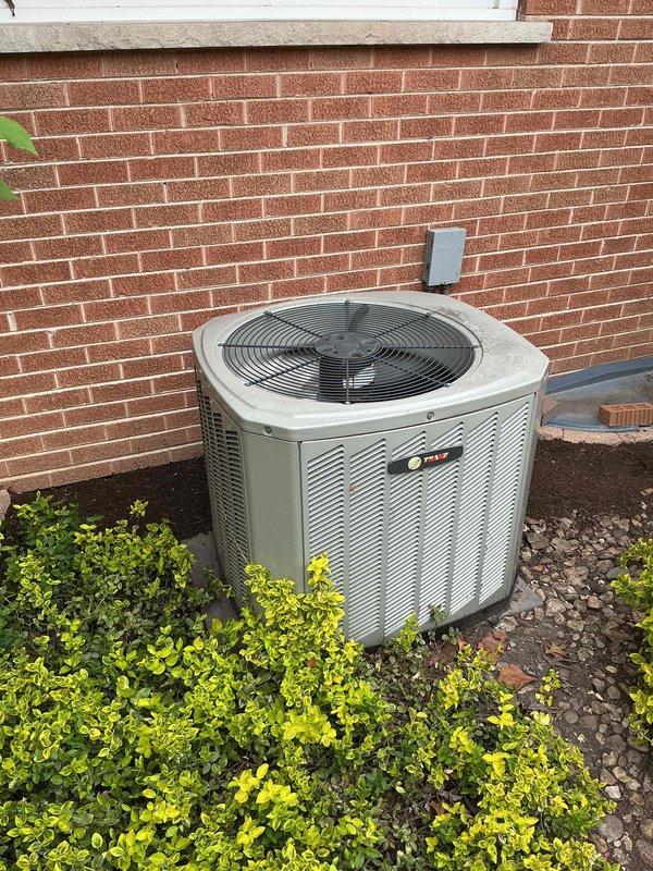 Completed preventative maintenance clean and check on residential air conditioning system per comfort plan agreement. Performed comprehensive inspection of outdoor condenser unit, verified electrical connections and amperage draws using digital multimeter, checked refrigerant pressures and temperatures on copper line set, and confirmed all safety controls and disconnect functionality. System operating within manufacturer specifications with no deficiencies noted.