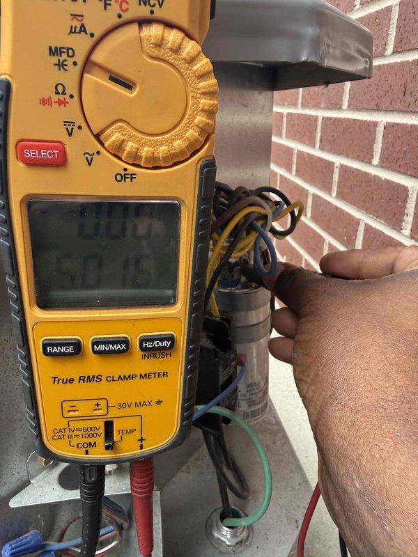 Completed comprehensive clean and check maintenance service on air conditioning system per comfort plan agreement. Performed electrical diagnostics using clamp meter to verify capacitor performance and measure voltage and amperage readings on outdoor condensing unit. All electrical components tested within manufacturer specifications and system operating properly.