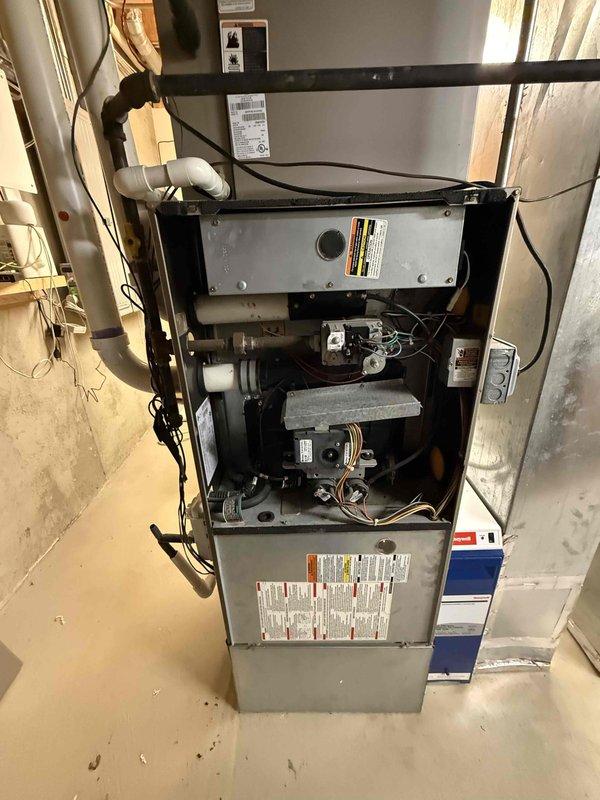 Completed comprehensive clean and check maintenance service on two air conditioning systems per service comfort plan agreement. Performed thorough inspection of furnace and blower assembly, including visual examination of internal components, burner assembly, electrical connections, and refrigerant lines. Verified proper operation of blower motor and wheel, confirmed all safety labels present, and ensured system components were clean and functioning within manufacturer specifications.