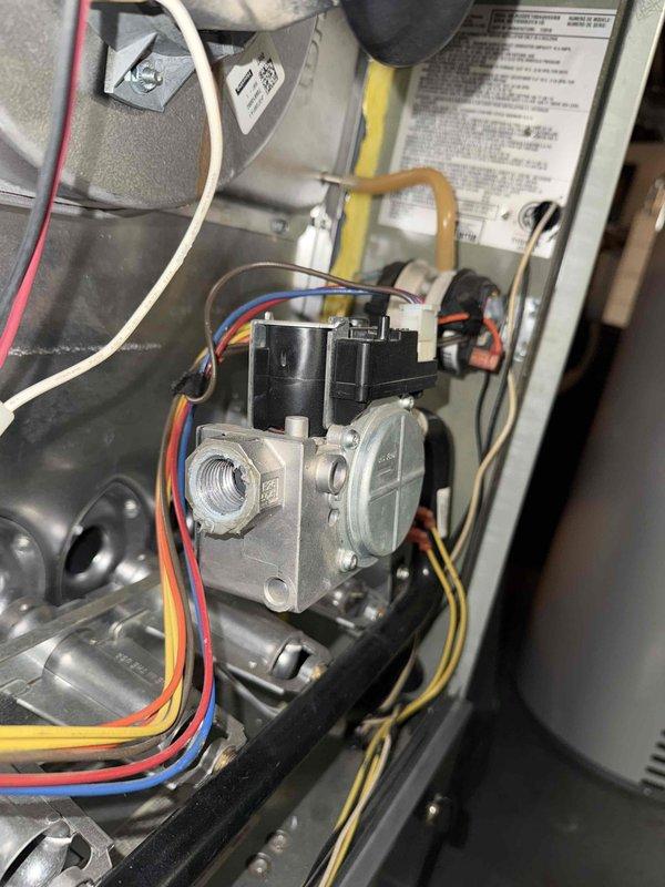Replaced defective gas valve assembly on furnace unit under manufacturer warranty. Disconnected electrical connections and gas line, removed failed valve, installed new OEM replacement gas valve, and reconnected all wiring and gas supply. Verified proper operation with diagnostic meter, confirmed gas pressure within specifications, and tested unit through complete heating cycle to ensure safe and reliable operation.