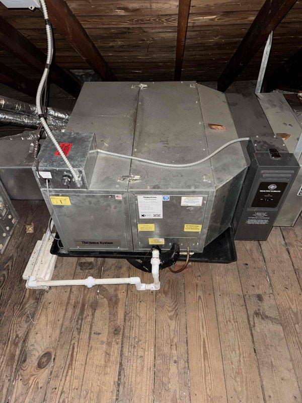 Completed comprehensive clean and check maintenance service on residential HVAC system including air conditioning unit, air handler, and electronic air cleaner per Comfort Plan agreement. Performed thorough inspection of attic-installed air handler, verified all mechanical and electrical components operating within specifications, replaced air filter, and collected payment for plan renewal.