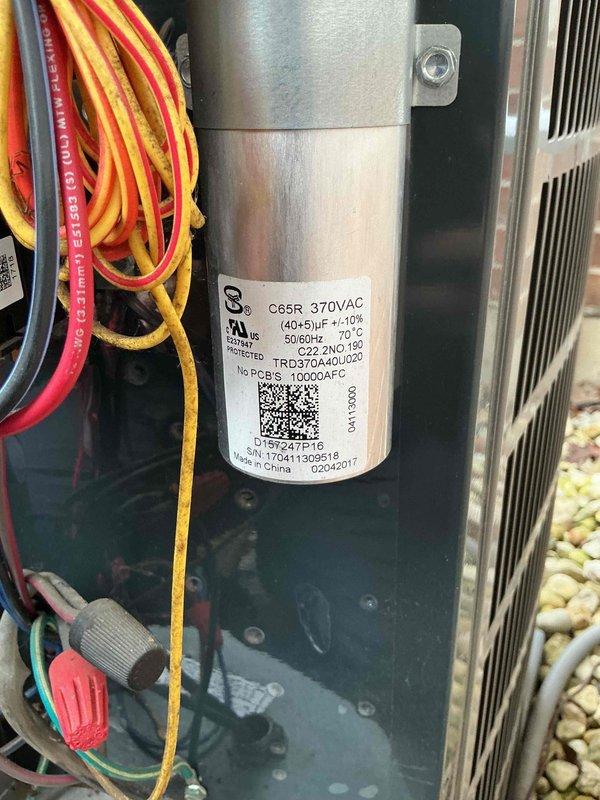 Completed annual air conditioning clean and check per service comfort plan. Inspected and tested dual-run capacitor rated at 40+5 µF 370VAC, confirmed proper operation within manufacturer specifications. Replaced 14x20x1 air filter and verified system airflow throughout unit.