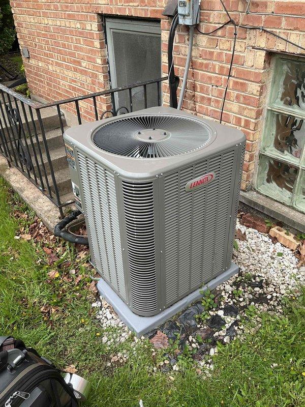 Completed comprehensive Comfort Plan clean and check maintenance on Lennox outdoor condensing unit. Performed thorough inspection of electrical components including capacitor, contactor, and wiring connections with proper terminations confirmed. Cleaned condenser coil, checked refrigerant pressures, verified proper airflow through louvers, and tested unit operation with all systems functioning within manufacturer specifications.