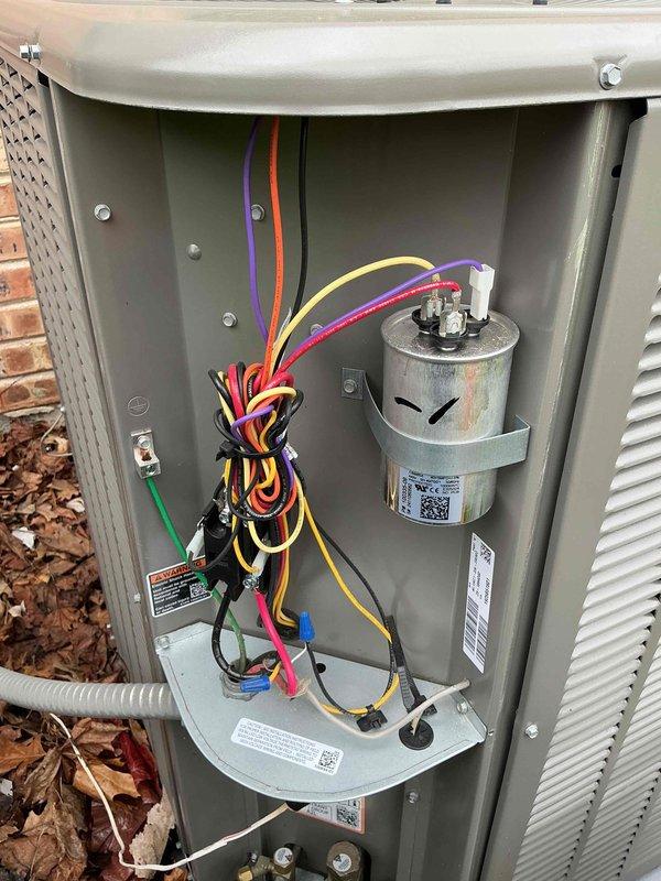 Completed comprehensive Comfort Plan clean and check maintenance on Lennox outdoor condensing unit. Performed thorough inspection of electrical components including capacitor, contactor, and wiring connections with proper terminations confirmed. Cleaned condenser coil, checked refrigerant pressures, verified proper airflow through louvers, and tested unit operation with all systems functioning within manufacturer specifications.