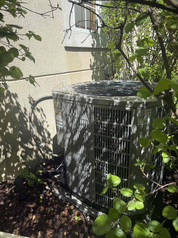 Performed comprehensive Comfort Plan maintenance on residential air conditioning system. Completed clean and check procedure on outdoor condenser unit, including inspection of fan assembly, coil cleaning, refrigerant level verification, and electrical connection testing. Unit operating within normal parameters upon completion of scheduled preventive maintenance visit.