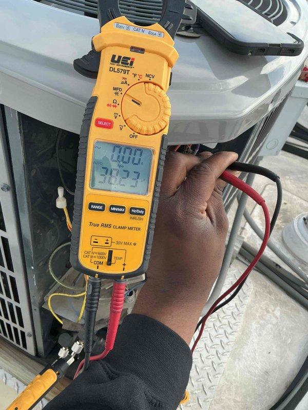 Completed comprehensive tune-up maintenance on single HVAC system per building special specifications. Performed electrical diagnostics using digital clamp meter to verify amperage and voltage readings at outdoor condensing unit, and conducted temperature measurements at indoor air handler unit in attic space to ensure proper system operation. Customer declined filter replacement service during this preventive maintenance visit.