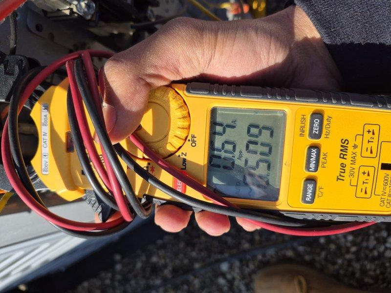 Performed preventive maintenance tune-up on single-system residential air handler unit located in utility closet. Conducted electrical diagnostics using digital clamp meter, recording amperage readings to verify proper system operation. Inspected air handler components, refrigerant lines, and electrical connections to ensure unit is functioning within manufacturer specifications.