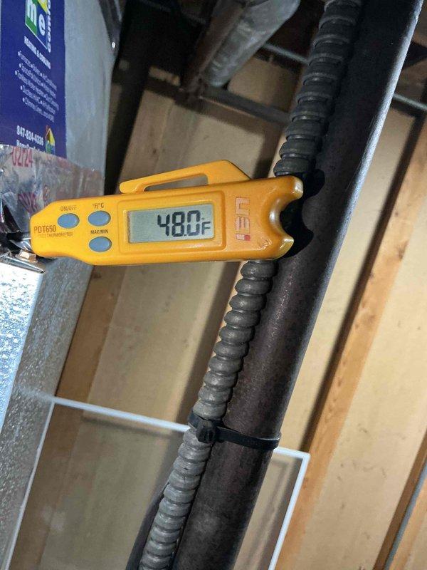Completed scheduled Comfort Plan maintenance on single-system air conditioning unit. Performed comprehensive clean and check protocol including inspection of outdoor condenser unit, verification of proper airflow through louvered panels, and assessment of refrigerant line temperatures. Measured discharge line temperature at 480°F to confirm proper heat transfer and system operation. Inspected condenser coil condition, fan operation, and electrical connections. Verified unit placement on concrete pad with adequate clearance from surrounding vegetation. System operating within normal parameters with no deficiencies noted. All components functioning properly at time of service completion.