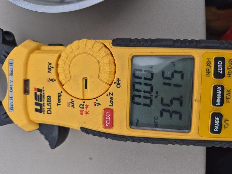 Completed AC/AH Clean and Check per building specifications. Performed comprehensive system inspection and maintenance on single cooling system. Measured electrical readings using clamp meter, verified amperage draw at 53 amps with system operating normally. Inspected evaporator coil and finned heat exchange components in confined access area, confirmed proper condition and airflow. Contacted customer regarding filter replacement option with no response received. System operating within normal parameters upon completion of tune-up service.