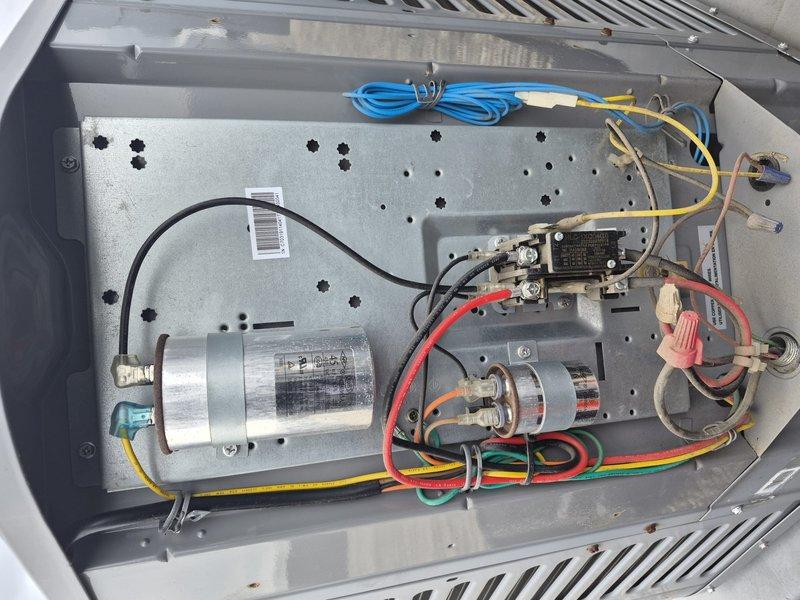 Completed comprehensive check and no-charge inspection per building special on single-system air conditioning unit. Performed visual inspection of electrical components including dual capacitors, contactor, and associated wiring connections. Measured and documented system electrical readings using digital clamp meter, recording 63-degree temperature reading. Contacted customer regarding optional filter replacement but received no response, so proceeded with inspection only. All internal components, wiring, and connections found in acceptable operating condition with no immediate repairs required at time of service.