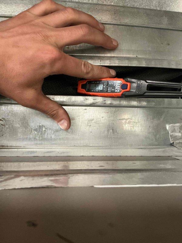 Performed clean and check service on single air conditioning system per building specifications. Conducted electrical diagnostics using clamp meter, measuring voltage at 238.4V and verifying amperage draw on outdoor condensing unit. Inspected capacitor, wiring connections, and terminal blocks; all electrical components found secure and functioning properly. Contacted customer regarding optional filter replacement with no response received. System operating within normal parameters upon completion of tune-up service.