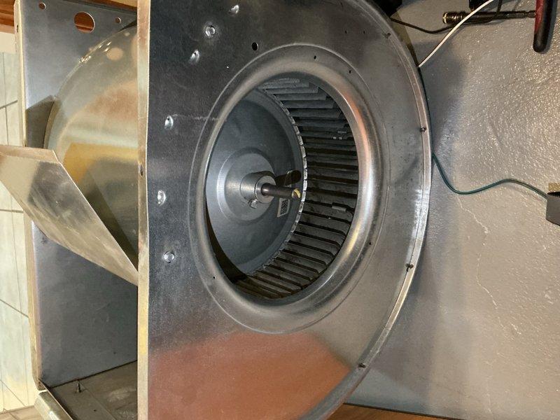 Responded to service call for non-cooling air conditioning system and found active refrigerant leak with low charge. Performed thorough inspection of accessible refrigerant connections and fittings but could not locate leak source at obvious connection points. Additionally removed and performed advanced cleaning of blower assembly due to heavy dirt and debris accumulation on blower wheel and housing that was restricting airflow. Recommended follow-up service to inject leak sealant and recharge refrigerant system to proper levels, as unit remains under manufacturer warranty coverage.