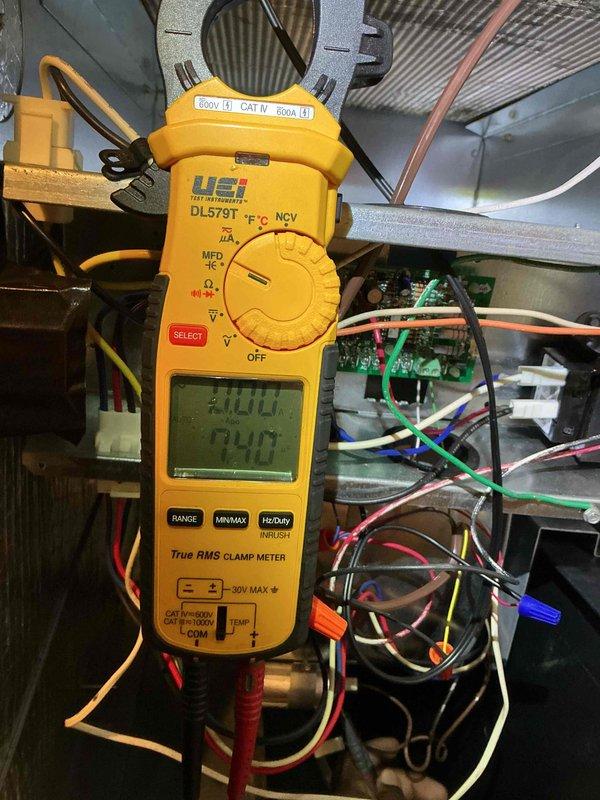 Completed comprehensive tune-up and diagnostic evaluation on single HVAC system per building specifications. Performed electrical measurements and system diagnostics using clamp meter, verifying voltage readings and amperage draw on outdoor condenser unit and indoor air handler components. Customer declined filter replacement at time of service, and applicable processing fee applies for credit card payment if selected.
