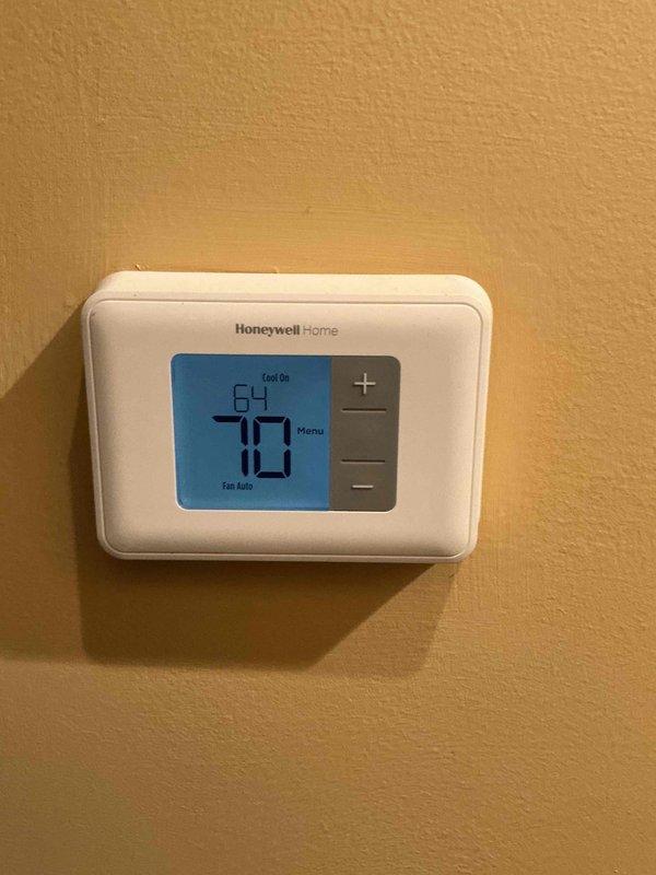 Completed annual clean and check maintenance service on one air conditioning system per Comfort Plan agreement. Performed comprehensive inspection of air handler and condensing unit, verified thermostat operation showing system cooling to setpoint, measured system amperage at 57.6 amps, and confirmed all components operating within manufacturer specifications.