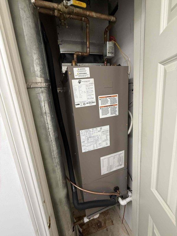 Completed AC/AH tune-up service per building specifications. Performed comprehensive system inspection and maintenance on rooftop-mounted air conditioning condenser unit. Collected customer no-call fee as specified; system operating without air filter per customer arrangement.