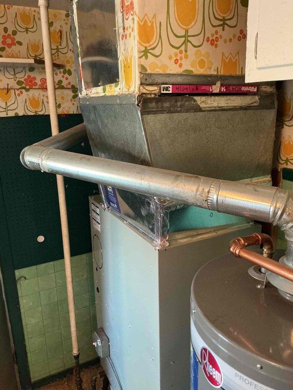 Performed comprehensive Comfort Plan clean and check maintenance on single HVAC system as requested. Completed thorough inspection of air conditioning unit located in mechanical room, including examination of cabinet housing, refrigerant lines, and condensate drainage system. Verified proper operation of all mechanical components, cleaned accessible surfaces, and documented equipment condition through photographic records to ensure system reliability and optimal performance.