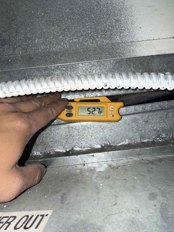 Completed preventive maintenance tune-up on single-system HVAC unit. Performed comprehensive inspection of air handler and associated ductwork, verified system operation with temperature readings at 52.1°F at supply vent, and provided replacement air filter to ensure optimal airflow and efficiency.