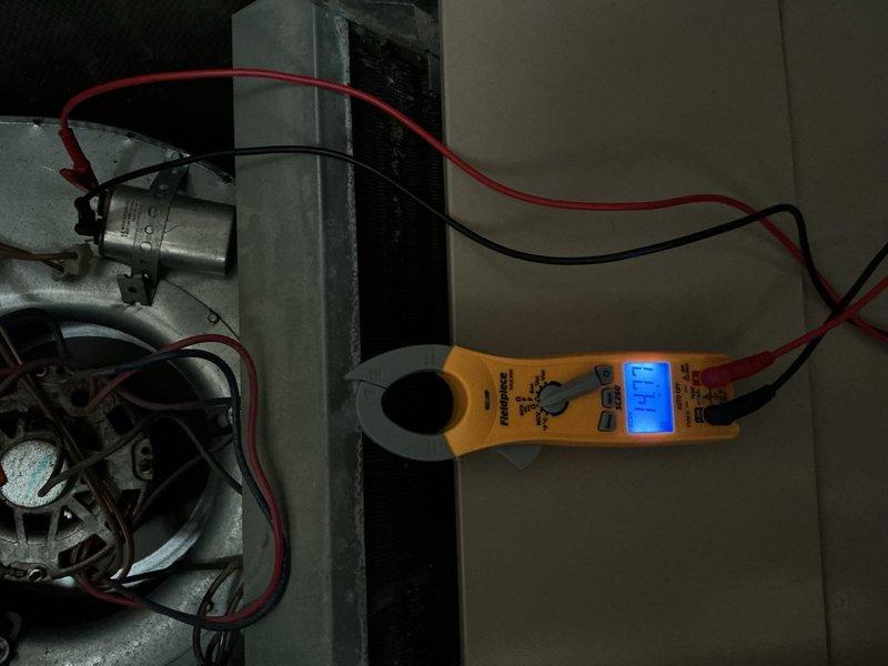 Completed comprehensive tune-up and diagnostic evaluation on residential HVAC system. Performed electrical testing on blower motor and contactor assembly using digital clamp meter to verify proper amperage draw and component function. Inspected all internal electrical connections, refrigerant line fittings, and mechanical components within air handler compartment, confirming system operational status. Customer declined filter replacement as they maintain their own supply.