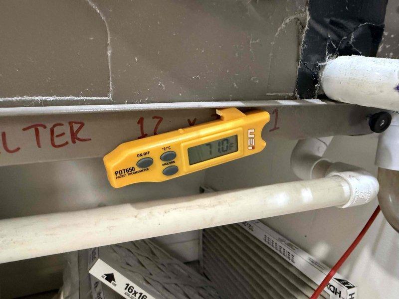 Performed comprehensive tune-up on single HVAC system including temperature diagnostics and system inspection. Measured supply air temperature at 70.9°F using calibrated digital thermometer on primary supply line, verified proper airflow through existing 20x20 filter media, and inspected refrigerant lines, PVC condensate drainage, and air handler components for proper operation. All system parameters found within normal operating range with no filter replacement required per service agreement specifications.
