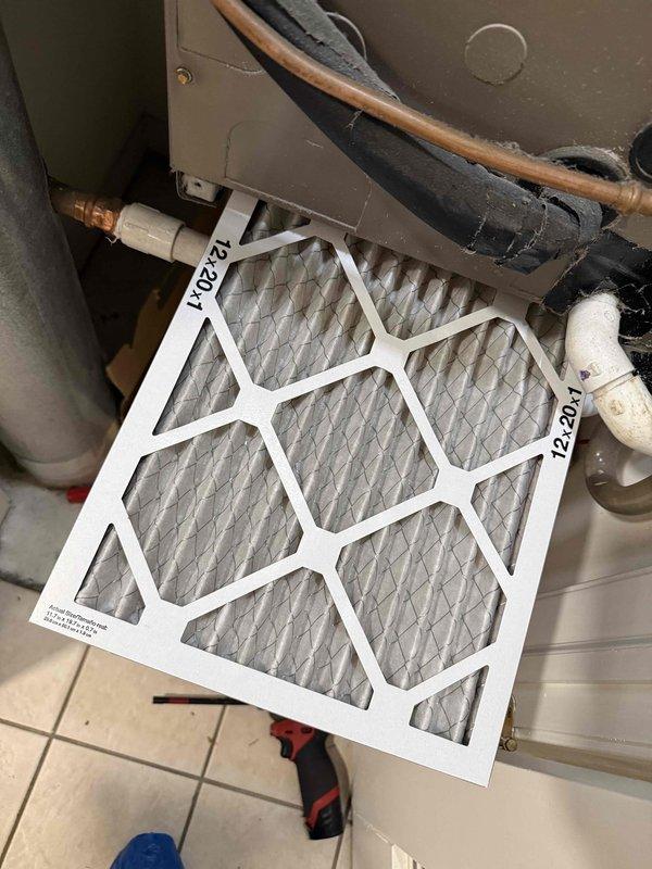 Performed comprehensive tune-up on single HVAC system including temperature diagnostics and system inspection. Measured supply air temperature at 70.9°F using calibrated digital thermometer on primary supply line, verified proper airflow through existing 20x20 filter media, and inspected refrigerant lines, PVC condensate drainage, and air handler components for proper operation. All system parameters found within normal operating range with no filter replacement required per service agreement specifications.