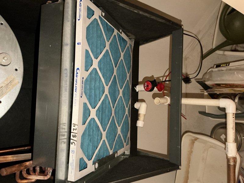 Completed preventive maintenance tune-up on single-zone HVAC system. Installed new 18x20x1 pleated air filter in air handler, inspected condensate drain lines and PVC piping for proper operation, and verified all mechanical components including blower motor assembly are functioning within normal parameters. System operational and ready for continued service.