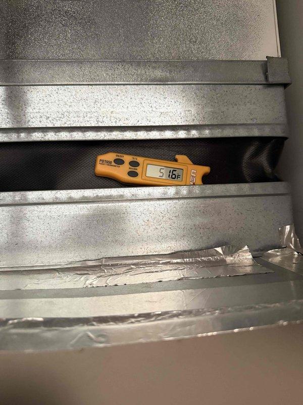 Completed comprehensive tune-up and maintenance on single HVAC system. Performed standard inspection of air handler blower motor assembly and measured supply air temperature at 51.6°F, indicating proper cooling operation. System cleaned, checked, and confirmed operational per maintenance protocol, with air filter service completed as requested.