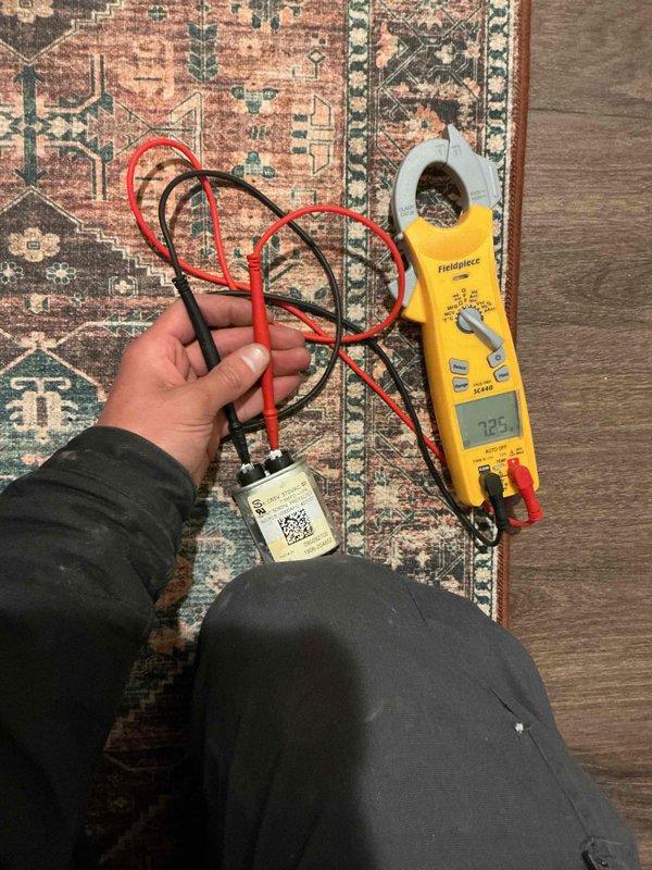 Completed comprehensive tune-up and performance evaluation on residential HVAC system in unit 203. Performed electrical diagnostics using clamp meter to verify amperage draw and system operation, measured supply and return air temperatures to confirm proper heat transfer and system efficiency. All components inspected and found operating within normal parameters.
