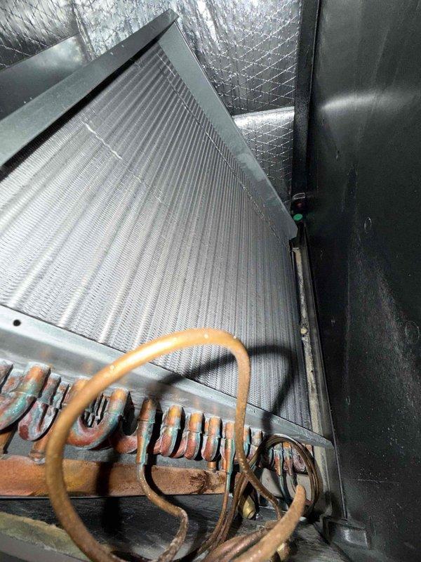 Completed comprehensive tune-up maintenance on single-system HVAC unit including air handler and condensing unit. Performed full system inspection, verified evaporator coil cleanliness and fin condition, tested capacitor functionality and electrical connections, checked refrigerant lines for proper insulation and integrity, and confirmed all mechanical components operating within manufacturer specifications. System cleaned, tested, and left in optimal working condition with no deficiencies noted.