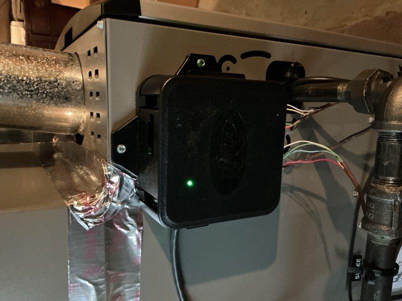 Completed full air conditioning system replacement on first floor unit. Reclaimed existing refrigerant from old condenser, evaporator coil, and line-set, then disconnected and removed all obsolete equipment. Installed new Lennox 2-ton 18 SEER2 variable speed condensing unit (Model EL18KCV-024-230) on new equipment pad and mounted matching evaporator coil in air handler. Connected new coil to existing copper refrigerant lines, evacuated system to remove moisture and air, then charged with R454B refrigerant to manufacturer specifications. Installed Lennox S40 communicating thermostat with Wi-Fi capability and touchscreen interface, configured for system communication and programmed for optimal operation. Installed refrigerant detection system (RDS) as required safety mitigation measure. Performed complete system start-up, tested all components for proper operation, verified airflow and temperature differential, and conducted comprehensive safety inspection. System operating within manufa
