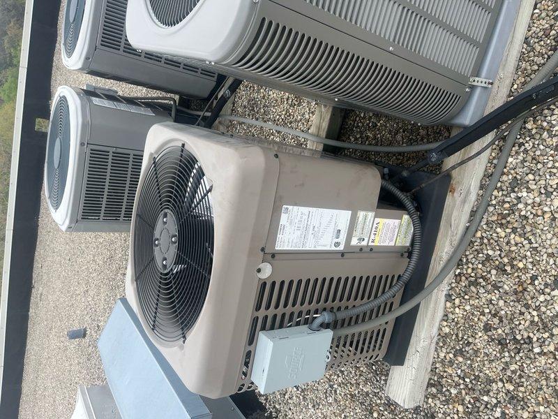 Performed comprehensive tune-up service on single residential HVAC system. Tested and verified run capacitor functionality using digital clamp meter, confirming proper capacitance reading of 30.3 microfarads within manufacturer specifications. Completed full system inspection of rooftop-mounted air conditioning unit, verifying operational status of condenser fan, coil condition, and electrical connections. Provided air filter per customer request and collected applicable service fee.